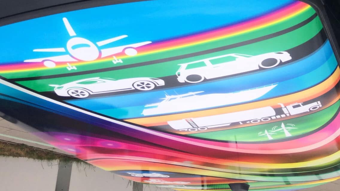 Full view of Daniel Hornby's competition-winning rainbow transport artwork fitted to a MINI roof