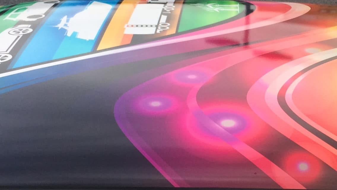 Pink and red flowing roof artwork with glossy reflections