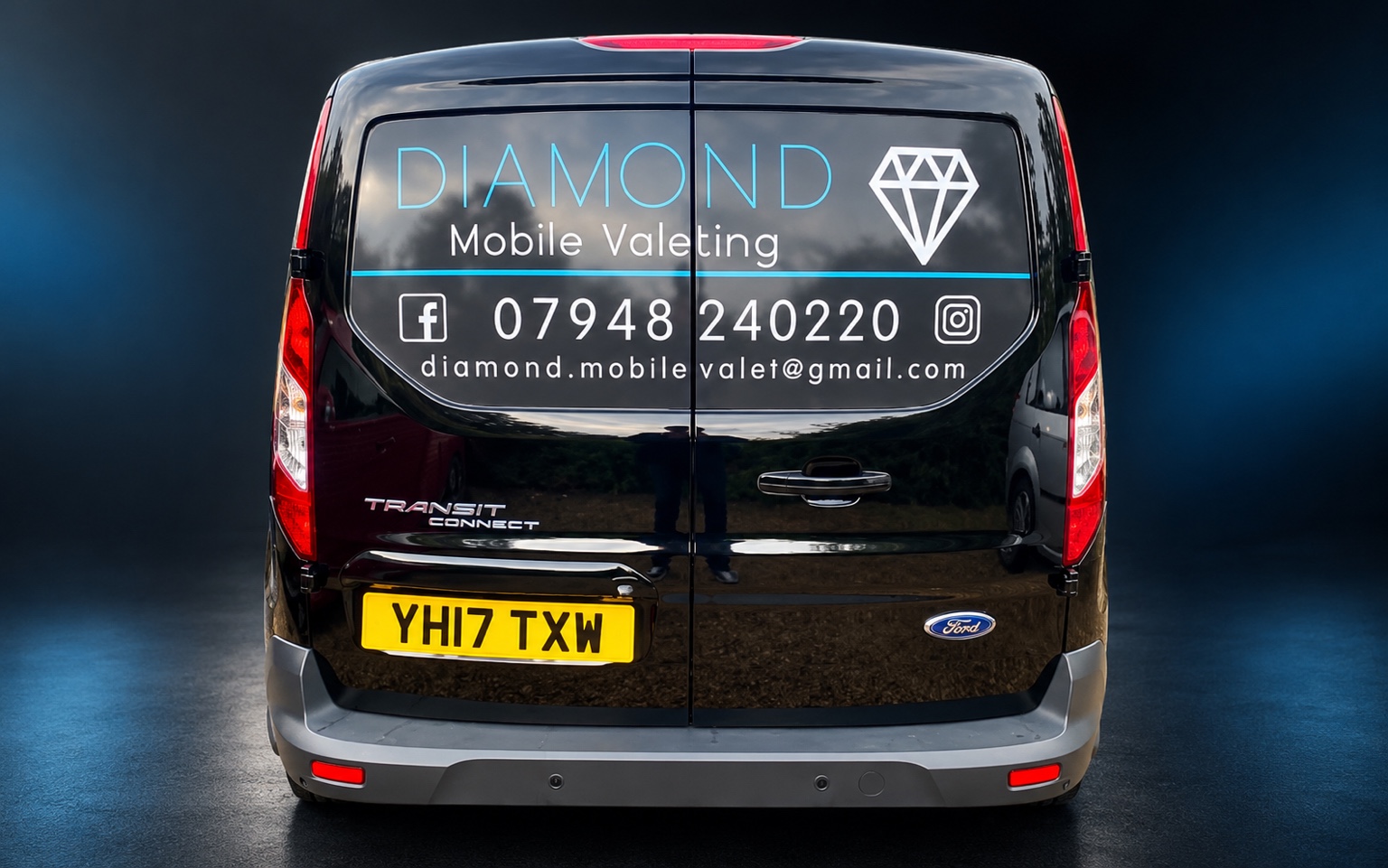 Diamond Mobile Valeting removable magnetic signs installed on the rear of a black Ford Transit Connect